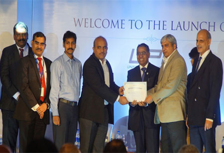 A group at a launch event in a photograph accompanying an interview with VSoft co-founder Murthy Veeraghanta