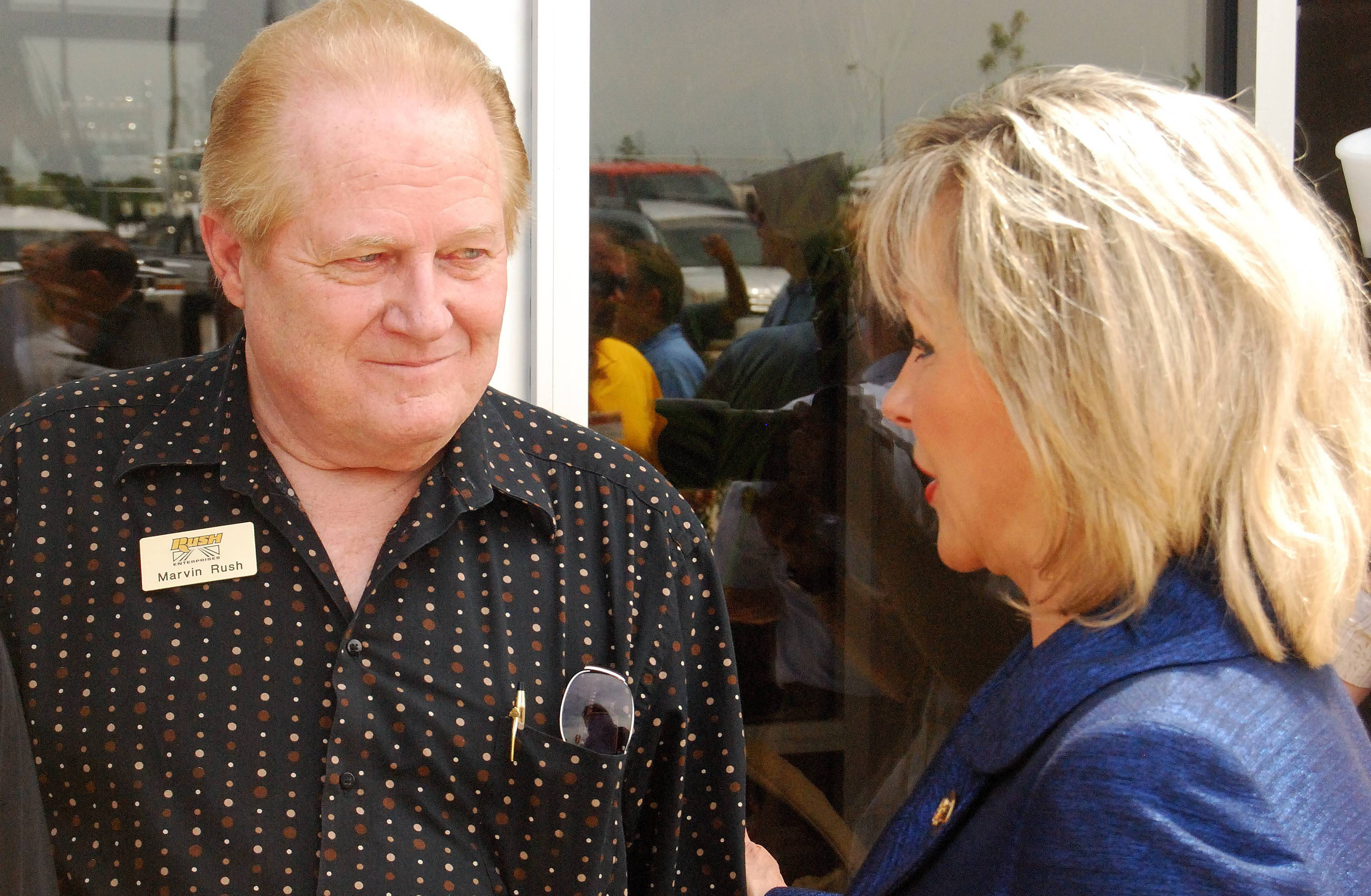 Marvin Rush speaking with Mary Fallin at the Oklahoma City facility opening in 2010