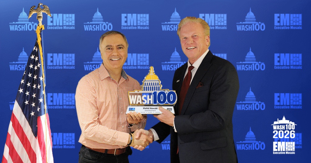Wahid Nawabi and Executive Mosaic CEO Jim Garrettson shake hands during the 2026 Wash100 Award presentation