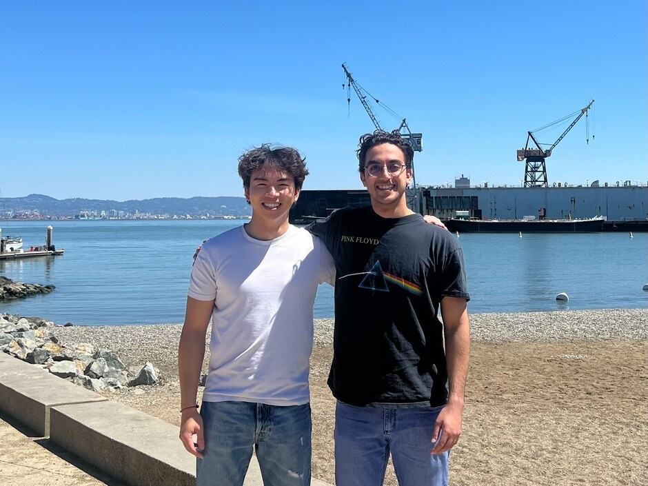 Moreta co-founders Sam Yu and Walid Mah'd standing together beside the waterfront