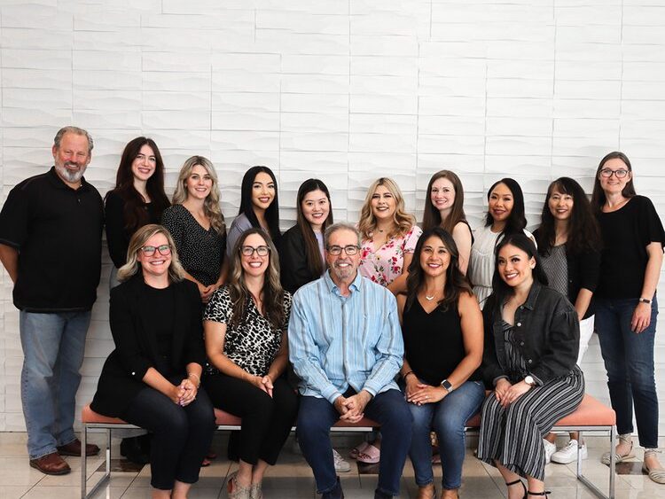 The Walt and Company team gathered for a group portrait