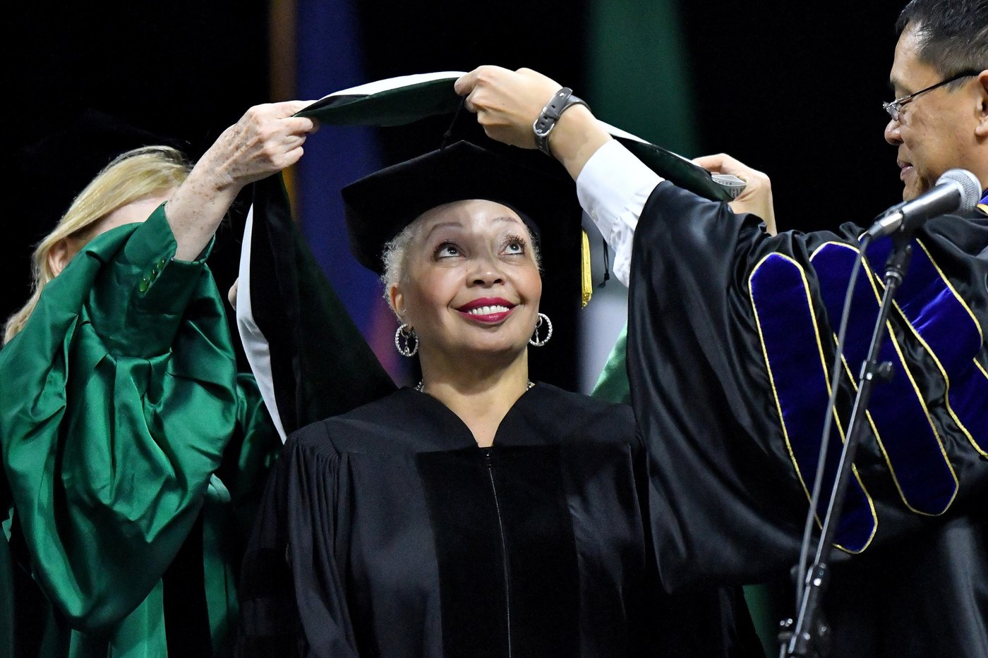 Wanda J. Herndon receives an honorary Doctor of Humanities hood at Michigan State University in 2018