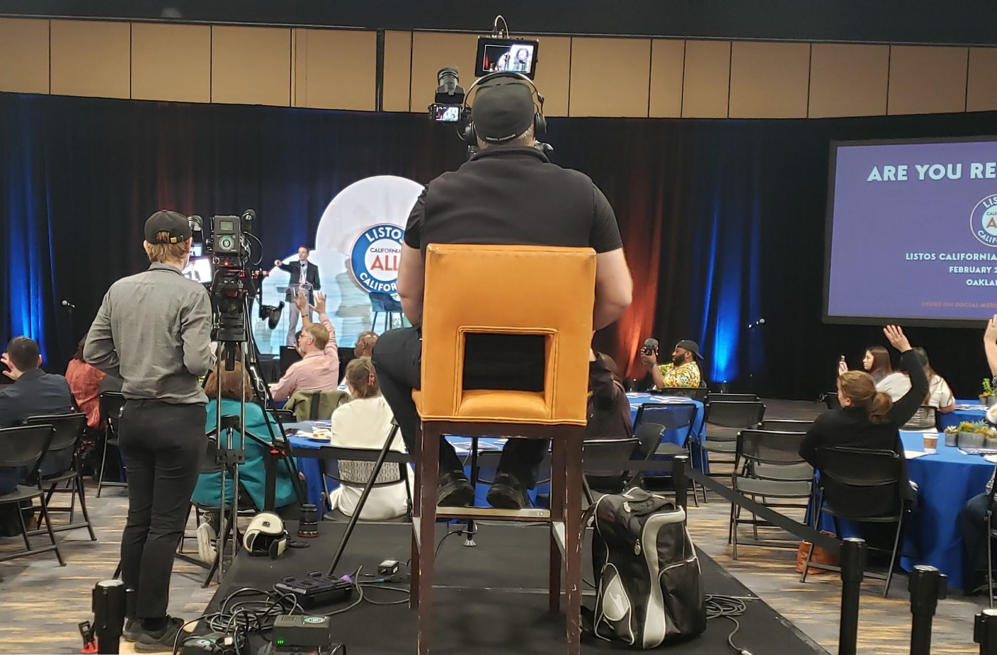 Camera crews and participants at a Listos California preparedness event
