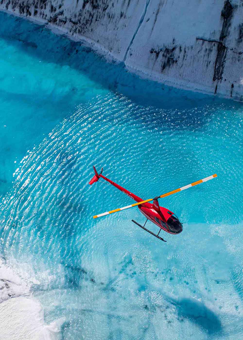 Helicopter on a glacier, pictured by Way as an Alaska Air Group adventure