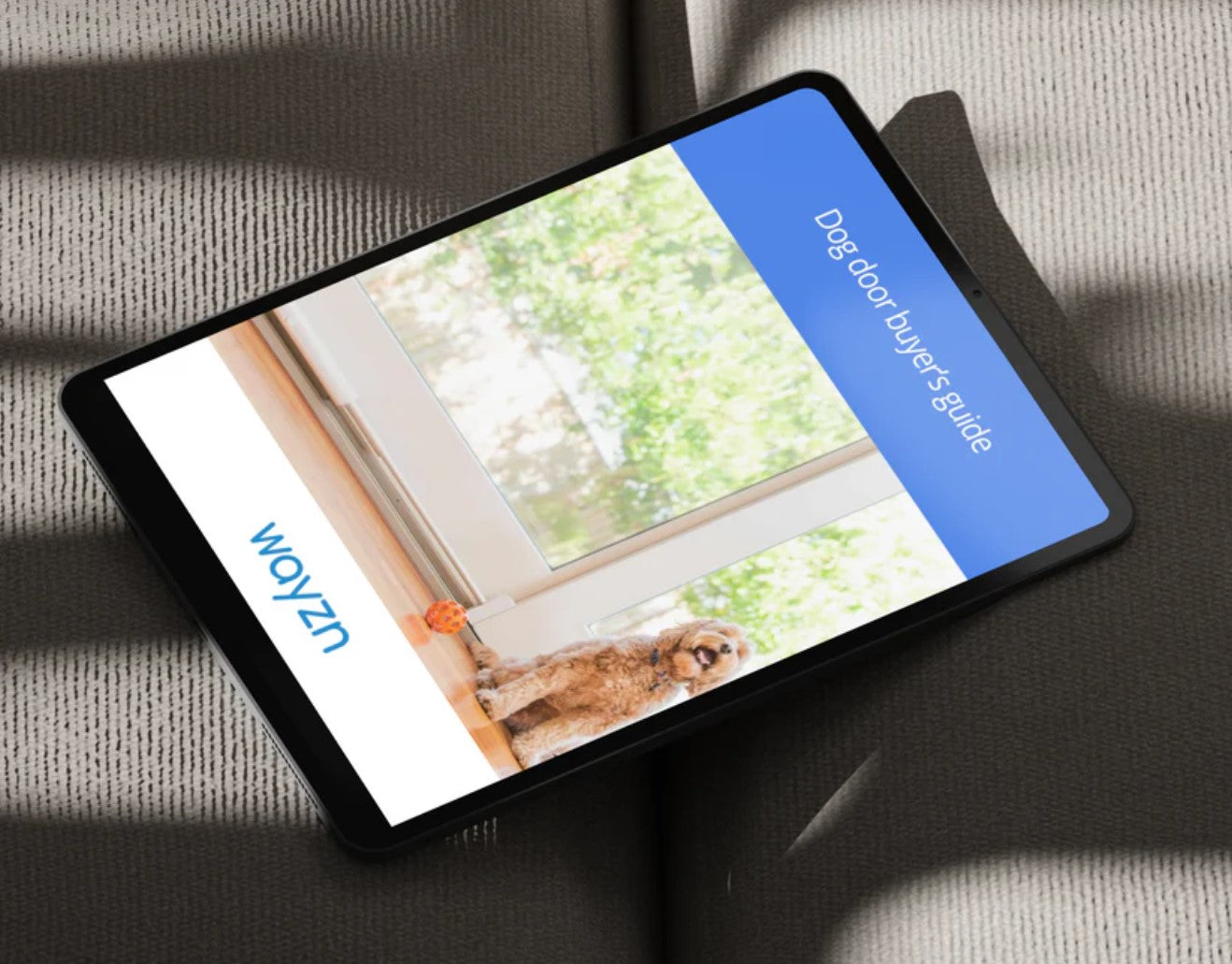 Wayzn Smart Pet Door device mounted on a sliding door track