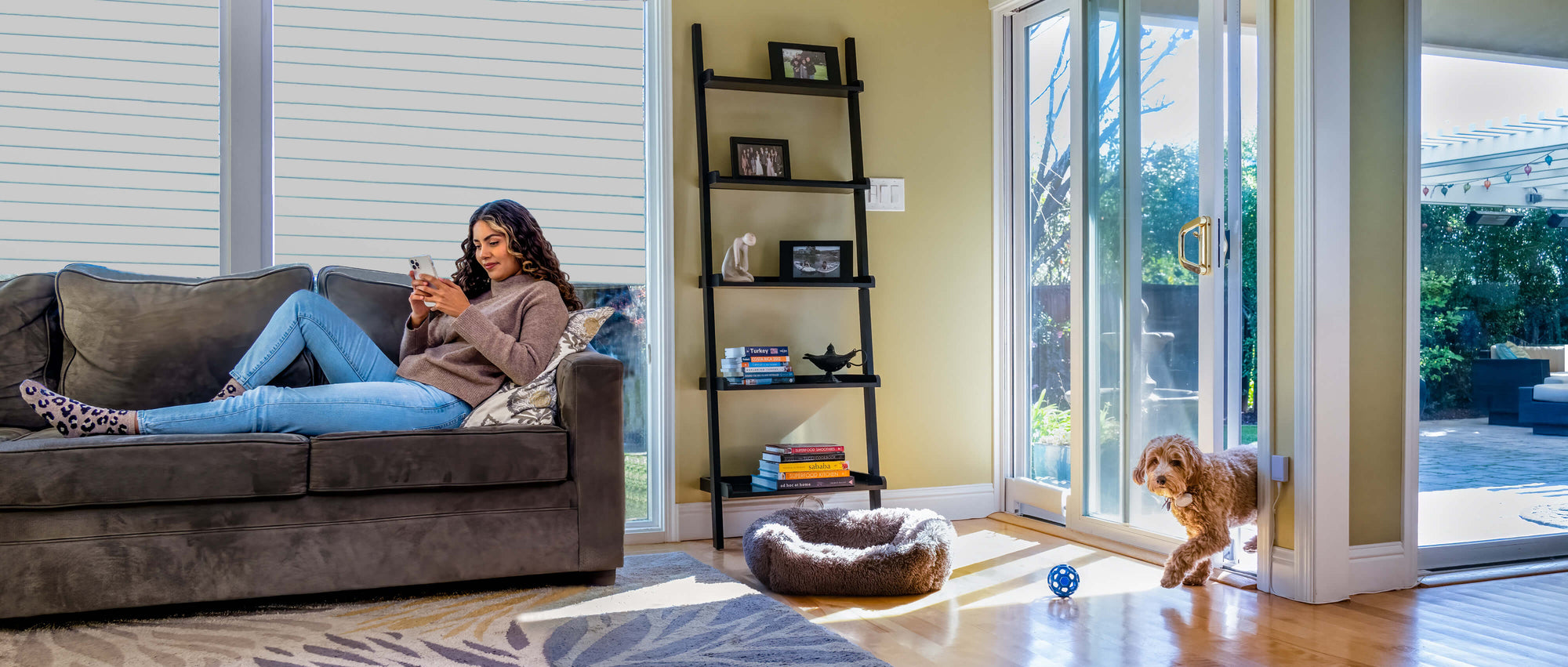 Wayzn smart pet door installed on a sliding glass patio door