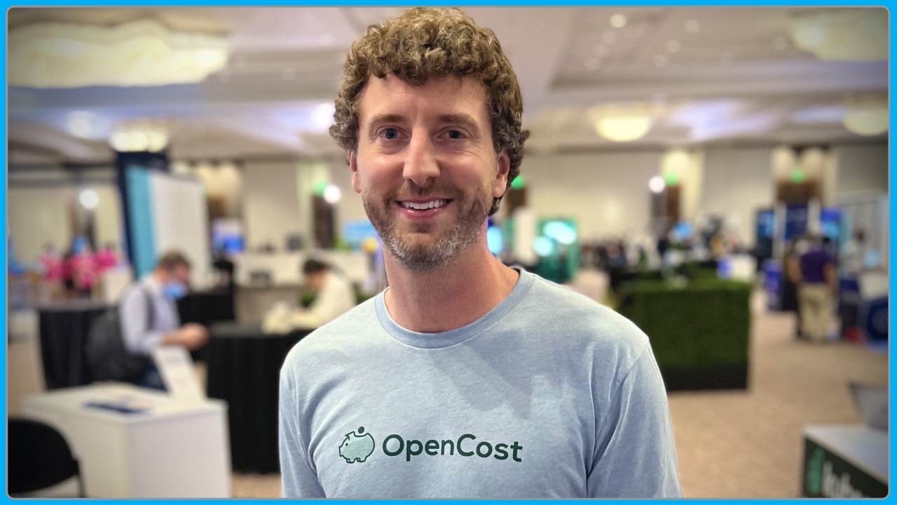 Webb Brown wearing an OpenCost T-shirt at Open Source Summit in Austin
