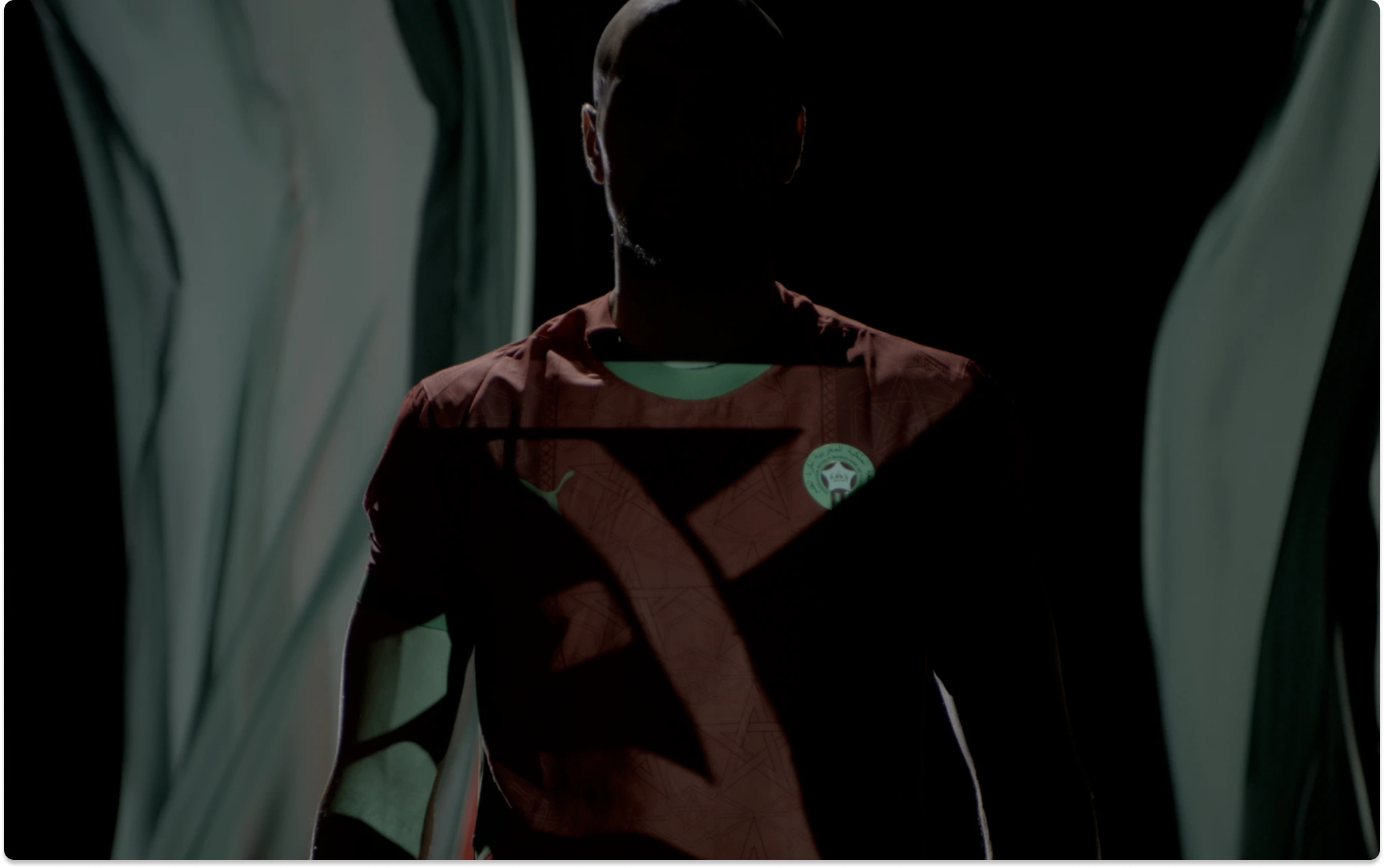Morocco football jersey in a dramatically lit image from Webloo’s FRMF portfolio