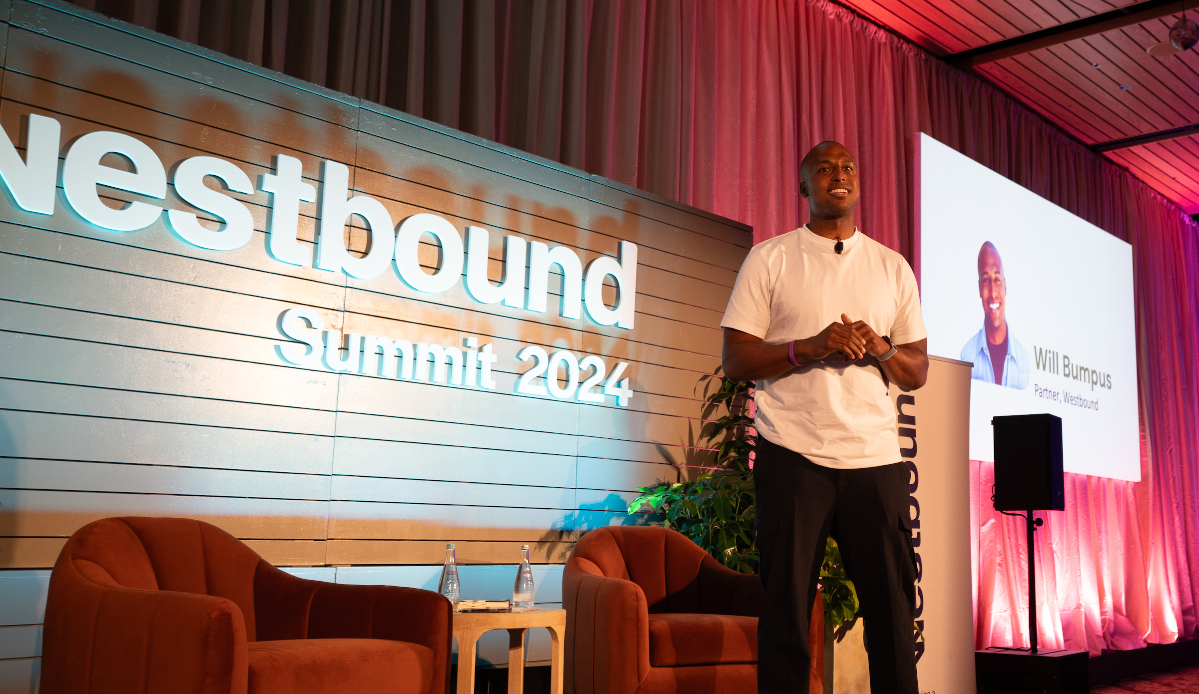 Westbound partner Will Bumpus speaking onstage at the firm’s 2024 Summit