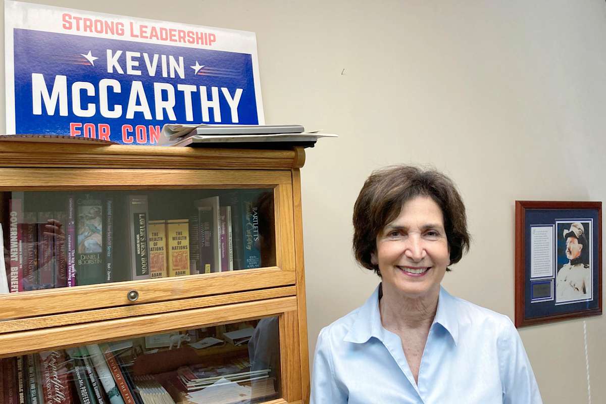 Cathy Abernathy seated in her Bakersfield office in 2022