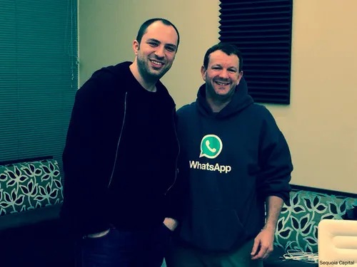 Jan Koum, left, and Brian Acton standing together