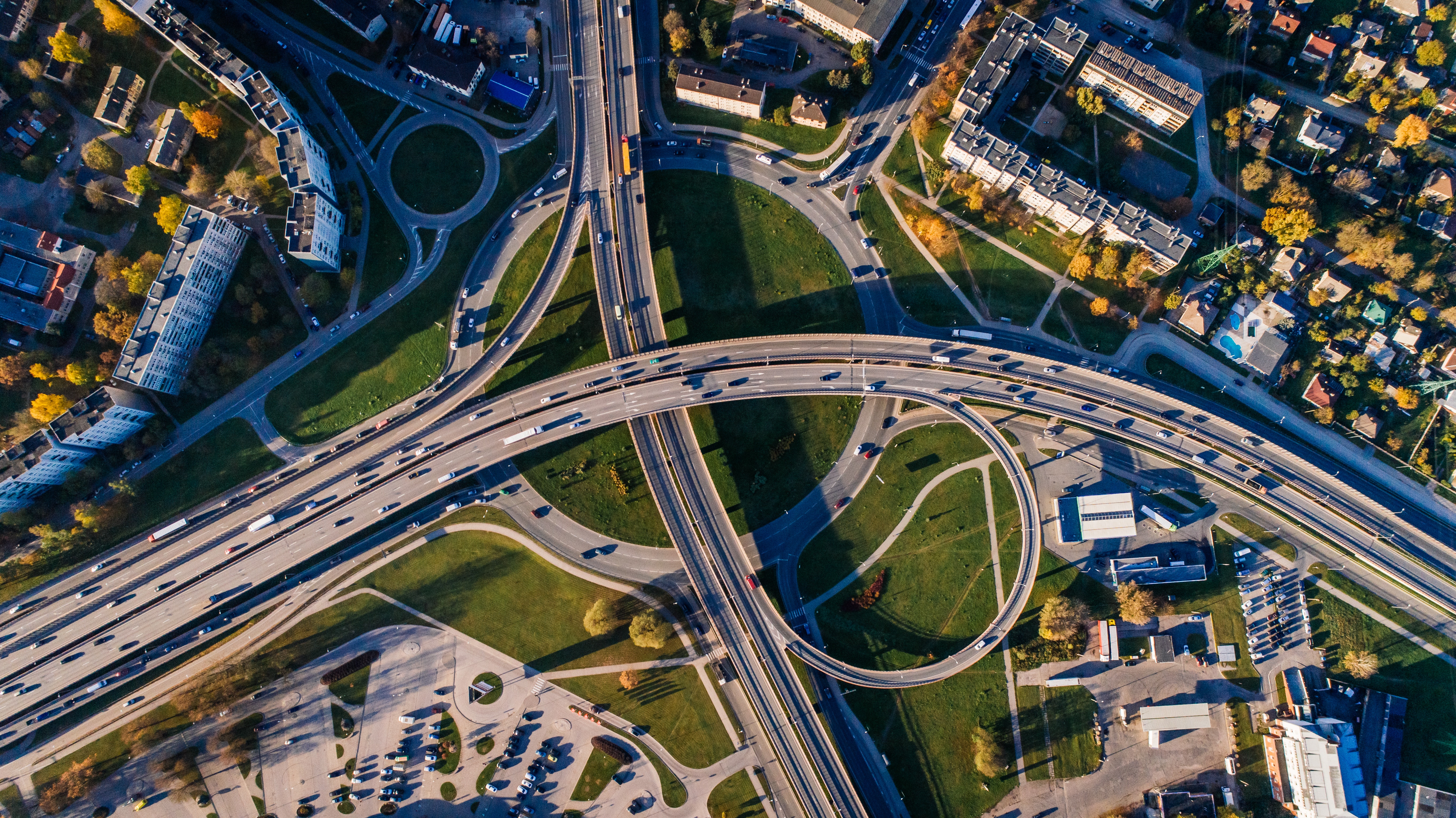 Aerial view of a complex highway interchange, representing corridor mapping work