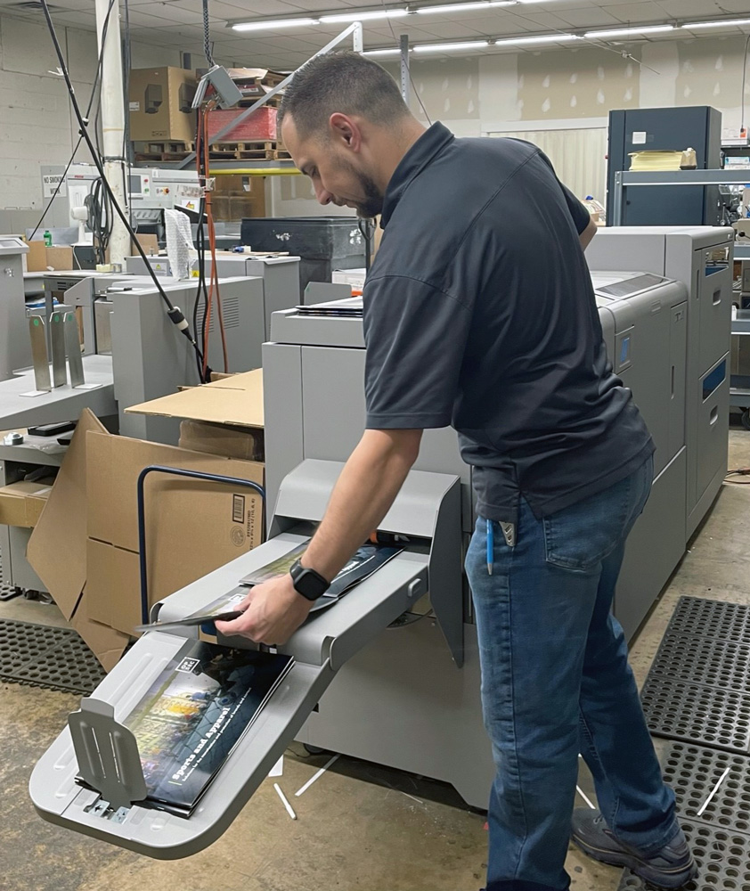 Finished booklets emerge from WhiteOak’s Morgana production line