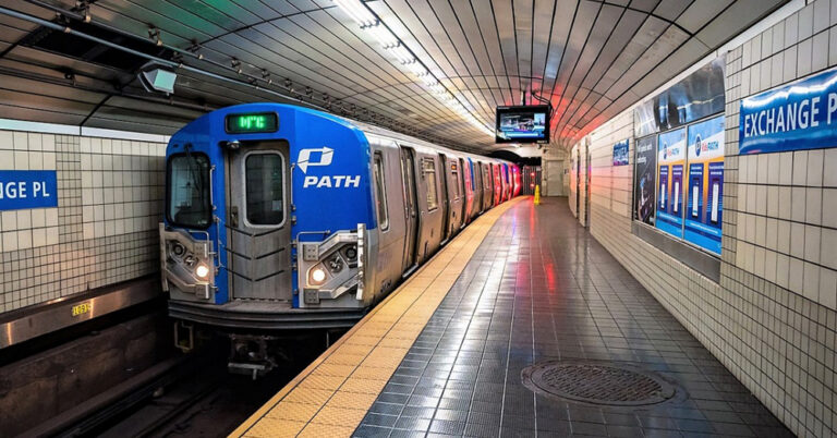 PATH train at the tiled Exchange Place station platform