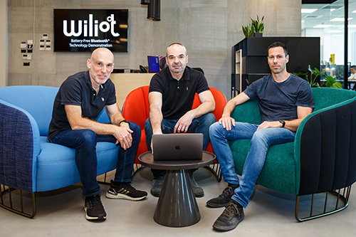 Wiliot’s three co-founders seated together in an office
