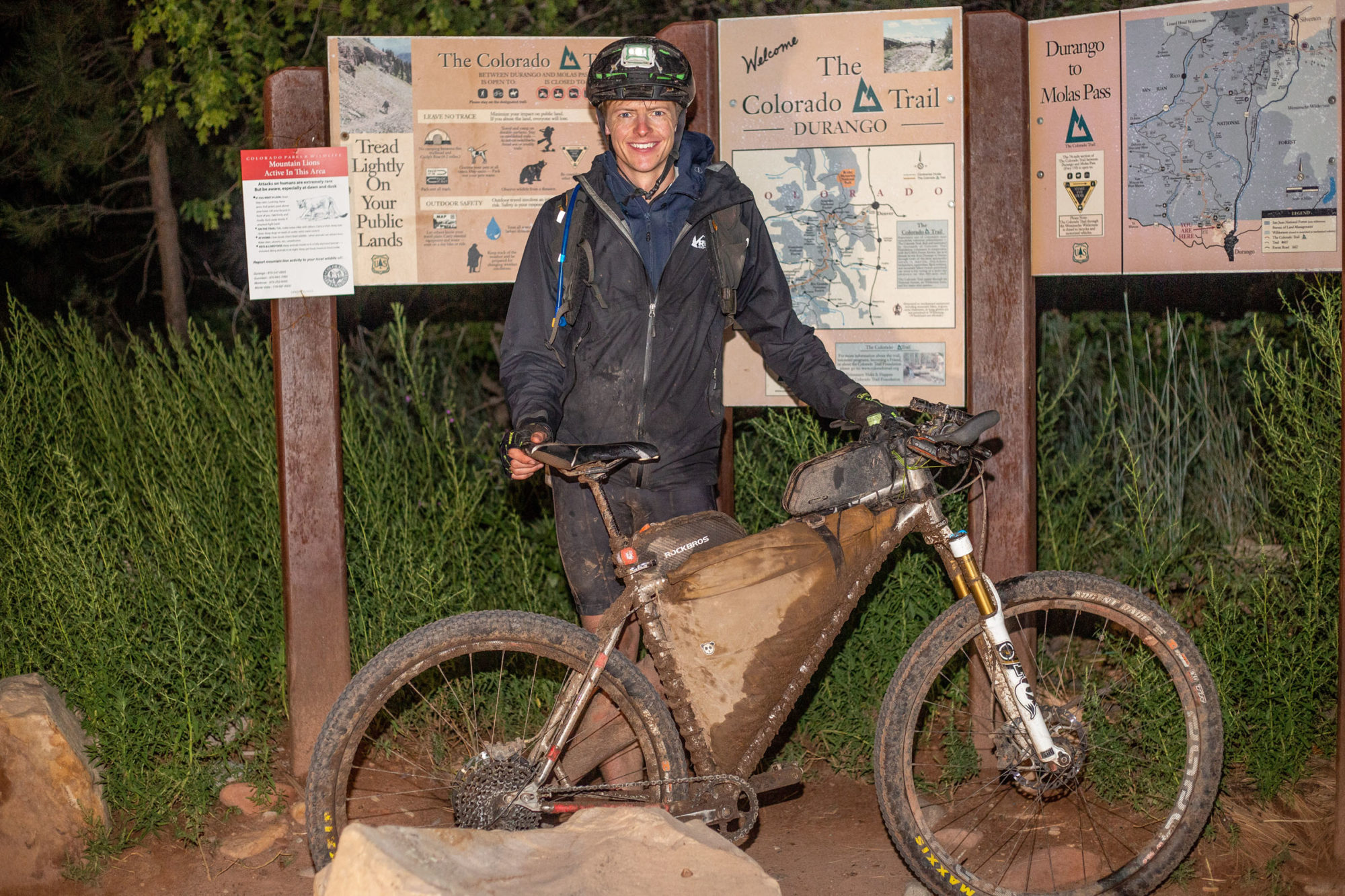 Will Bodewes with his loaded mountain bike at the Colorado Trail trailhead in Durango
