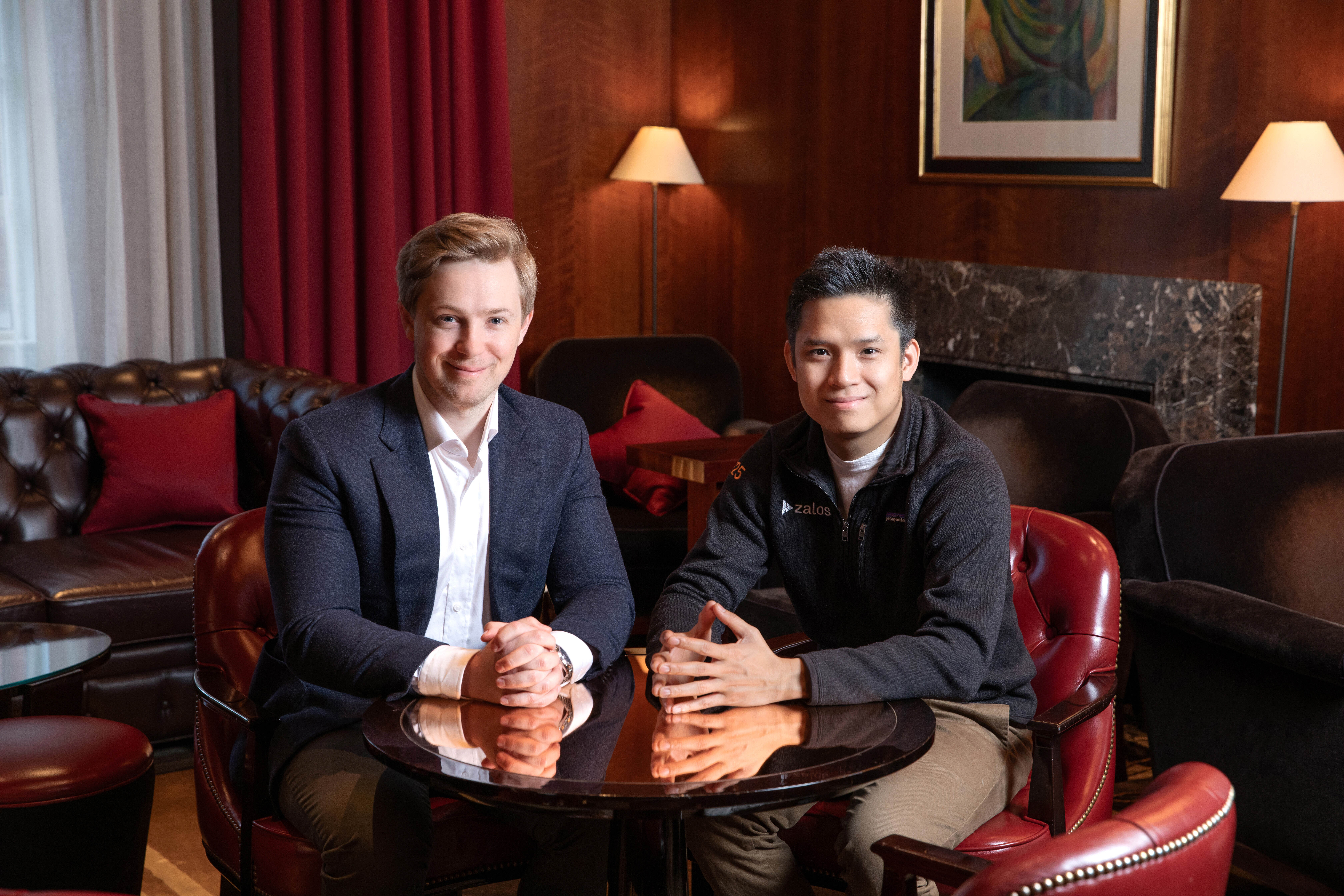 William Fairbairn, left, and Zalos co-founder Hung Hoang seated together at a table