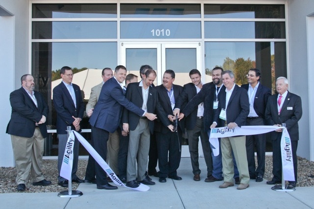 Company executives and local officials cut a ribbon outside Agility’s Salisbury factory in 2015.