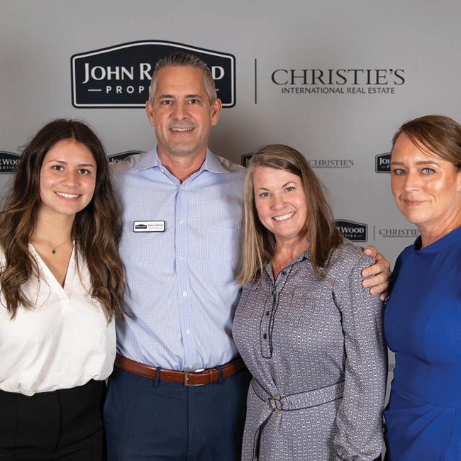 Wilson Creative Group staff with client John R. Wood Properties