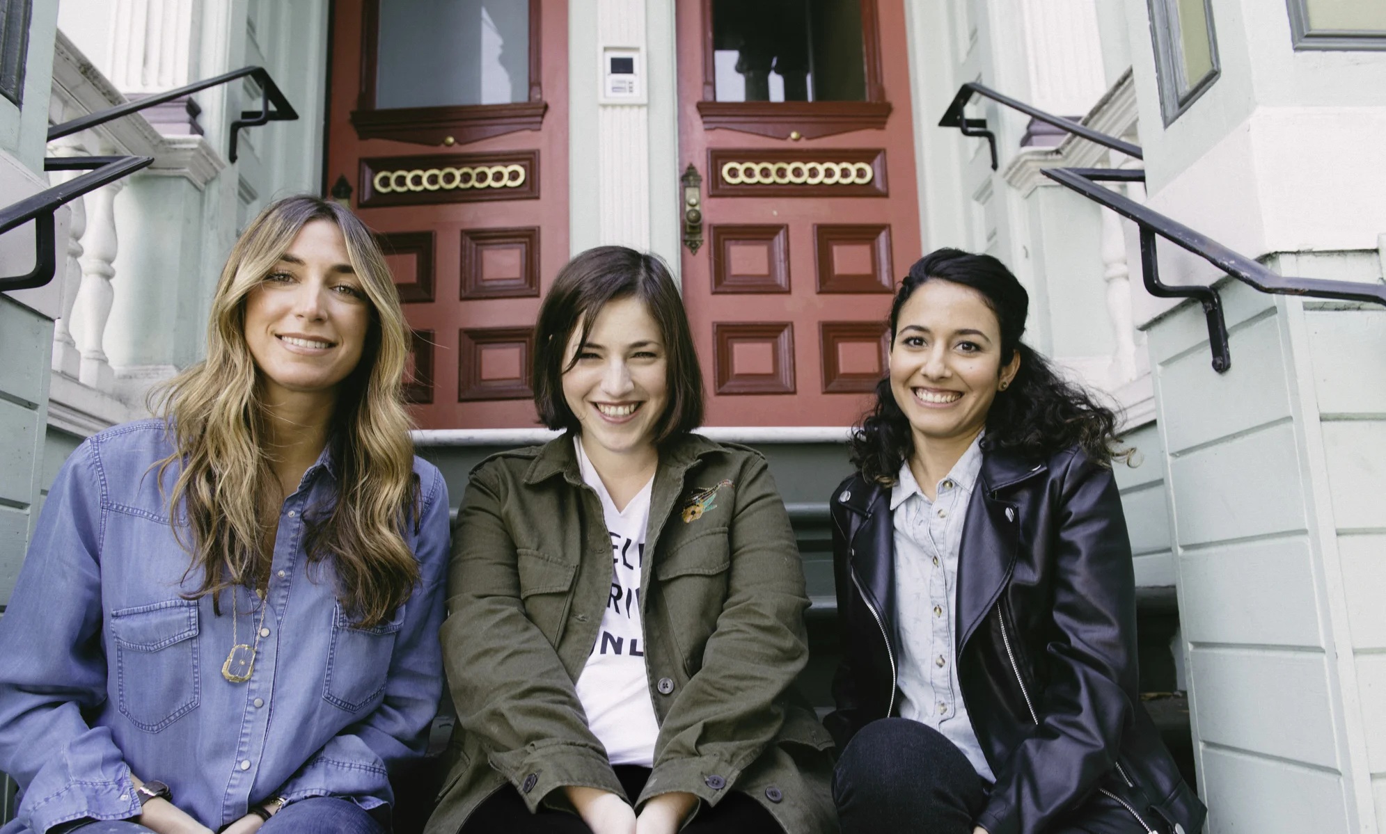 Wishi co-founders Clea O’Hana, Lia Kislev and Aya Elhanan seated together on outdoor steps