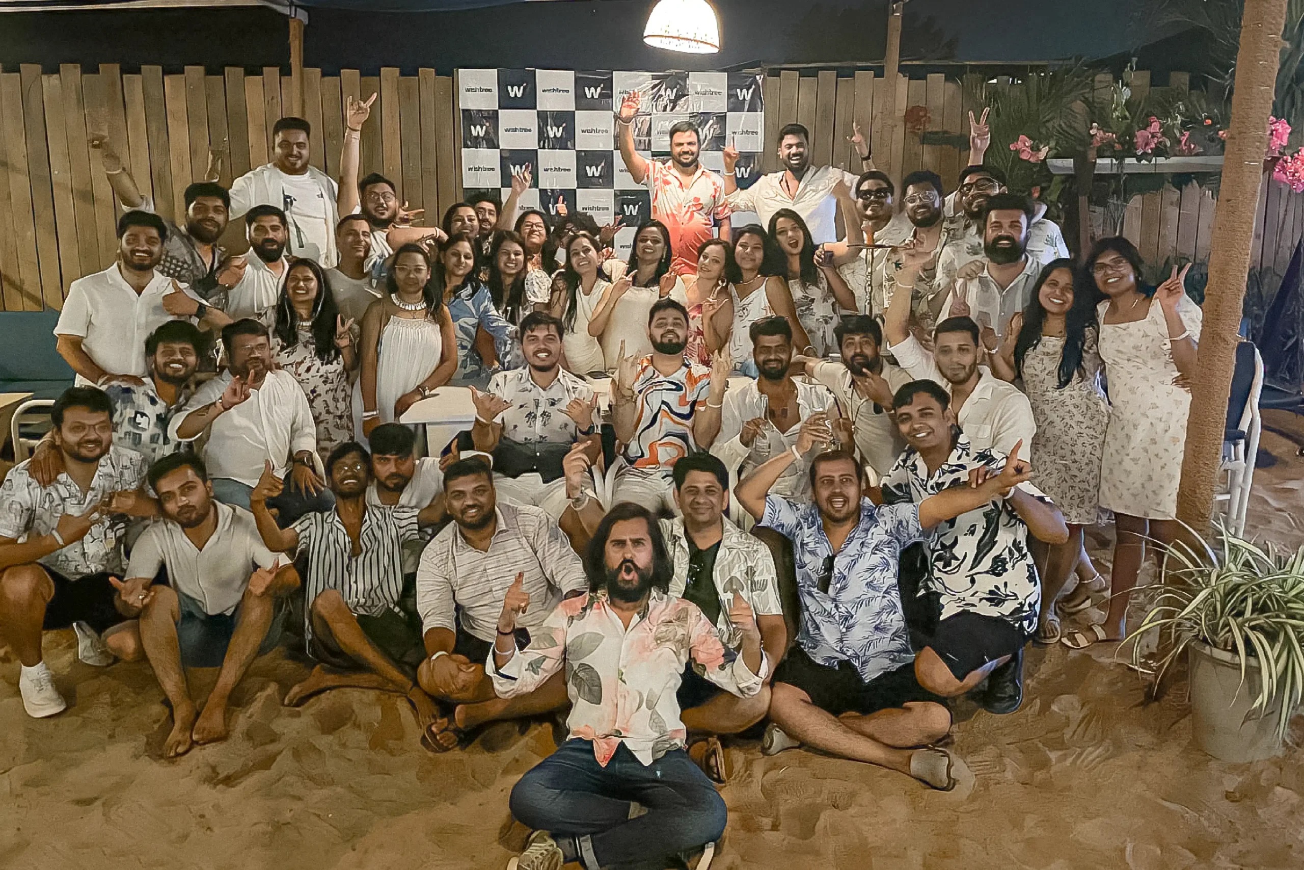 Wishtree team members gathered for a group photograph at a social event