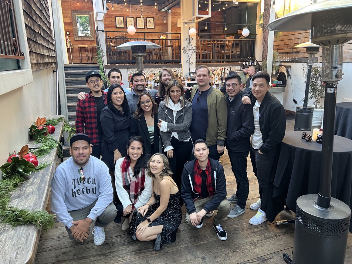 A group of Wonderful Agency colleagues posing together at a team gathering
