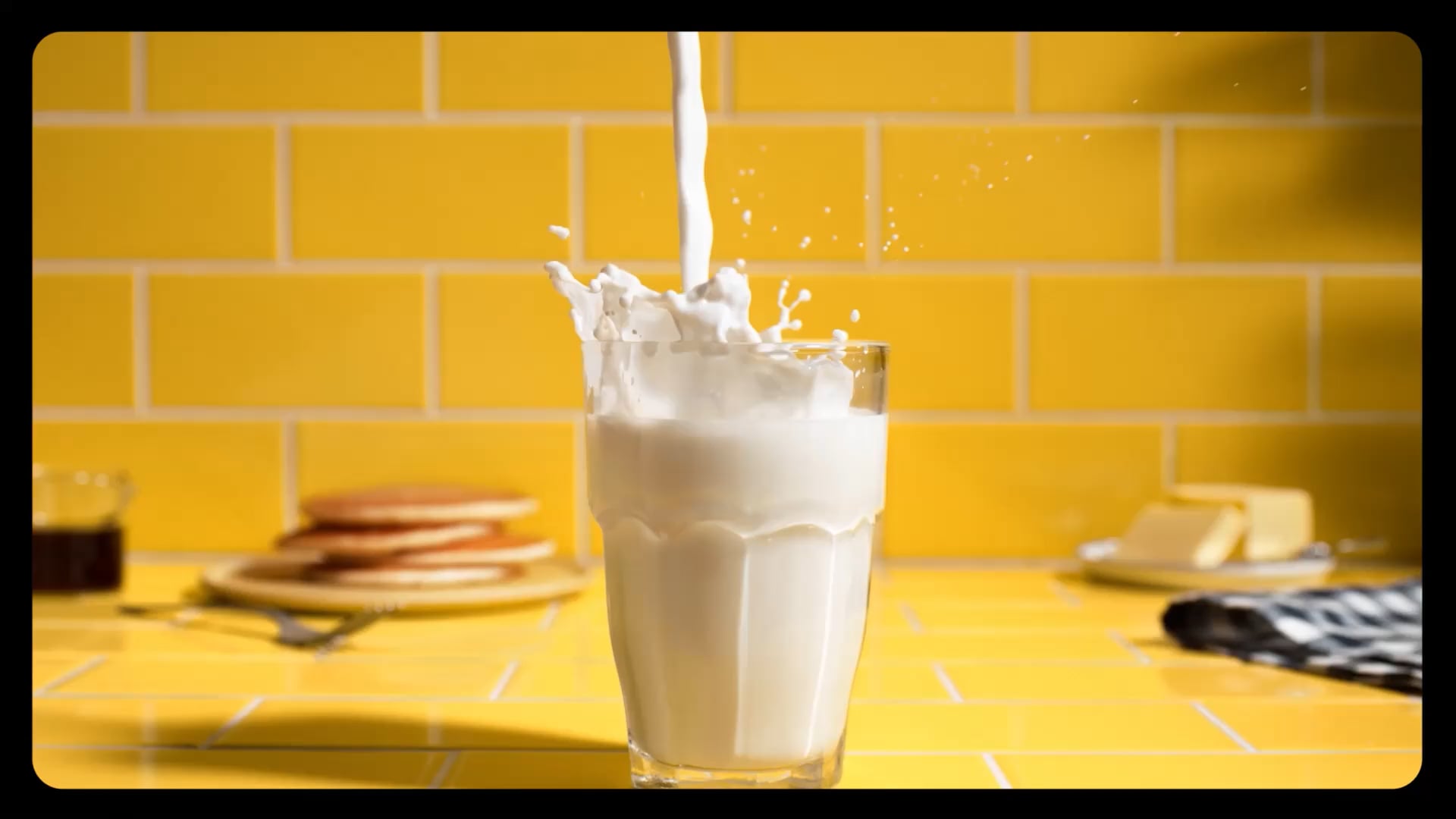 Alta Dena campaign imagery arranged in a colorful Southern California scene