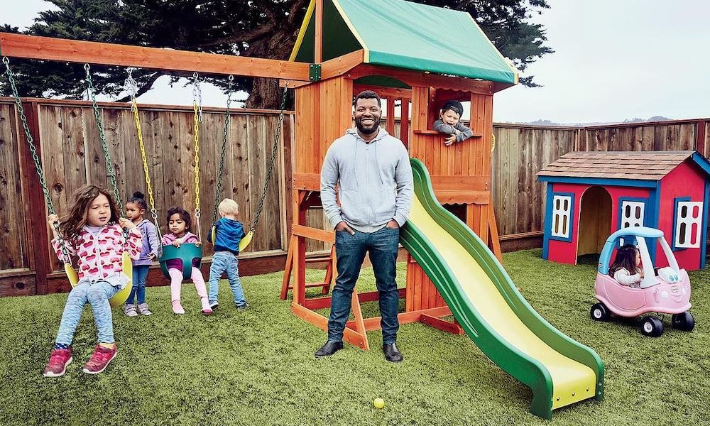 Wonderschool co-founder Chris Bennett standing at a childcare playground