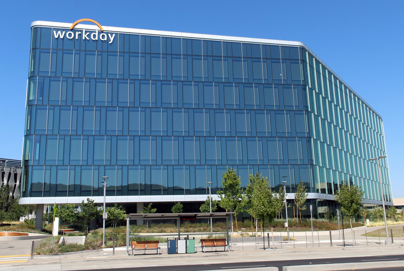 The glass exterior of Workday headquarters in Pleasanton, California