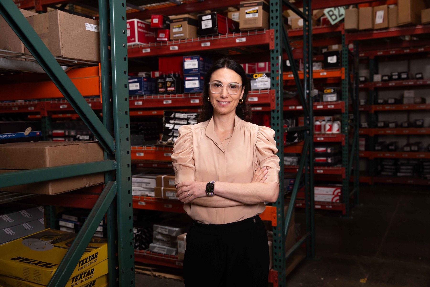 WorkWhile cofounder Jarah Euston standing in a warehouse