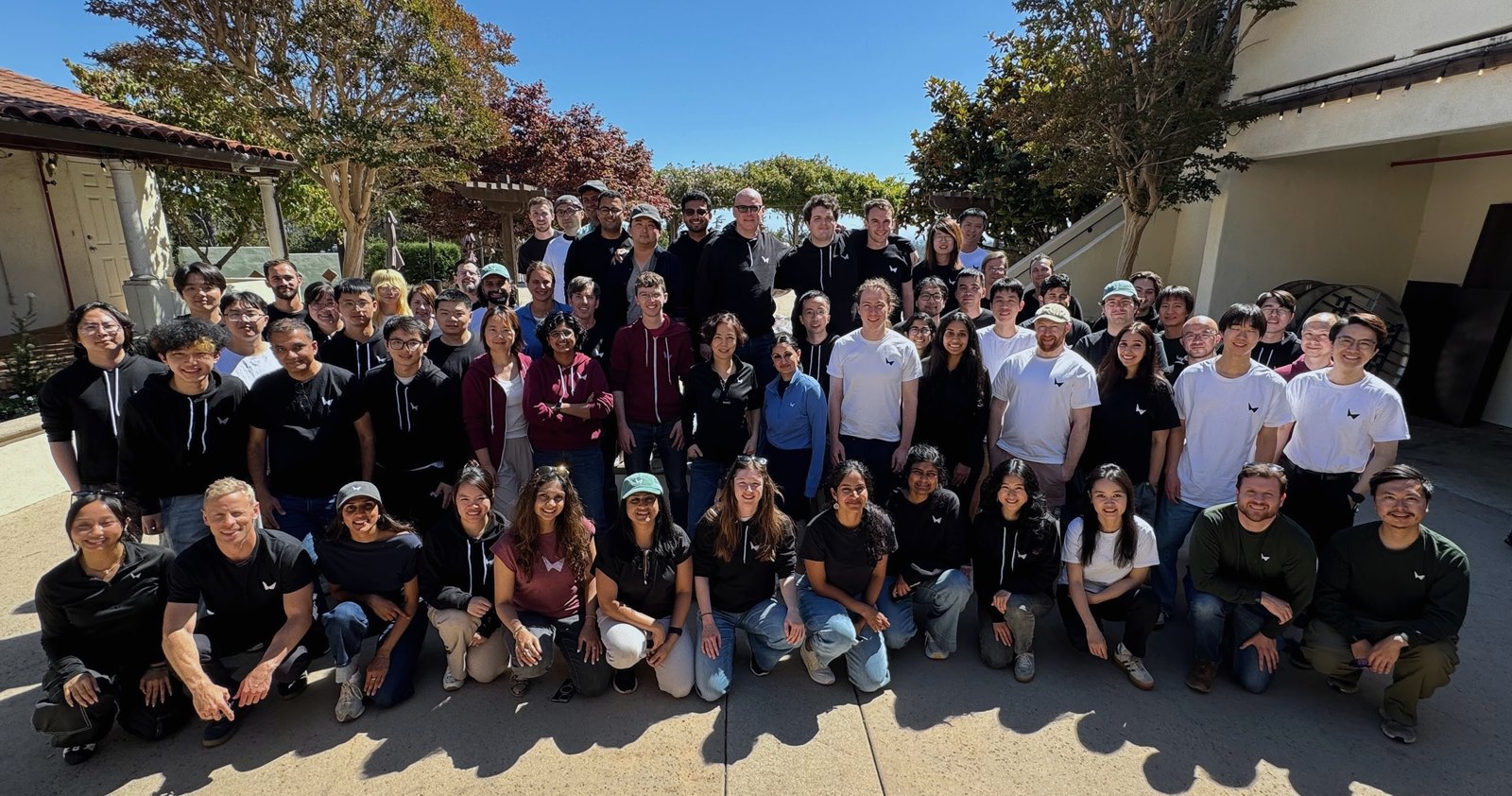 World Labs team assembled outdoors for a group photograph