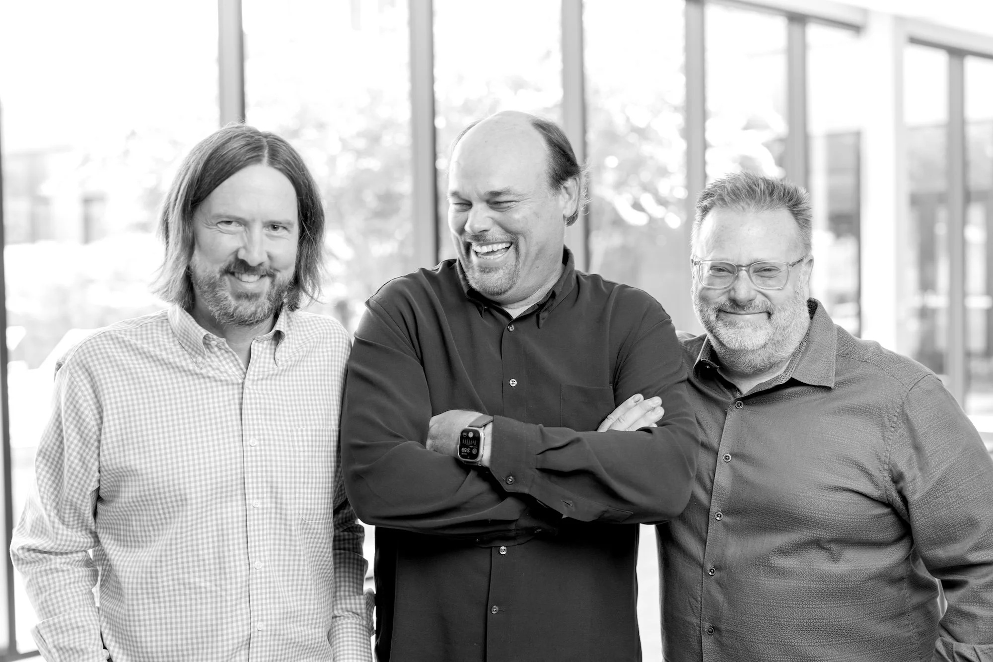 Worlds co-founders Ross Bates, Dave Copps, and Chris Rohde standing together