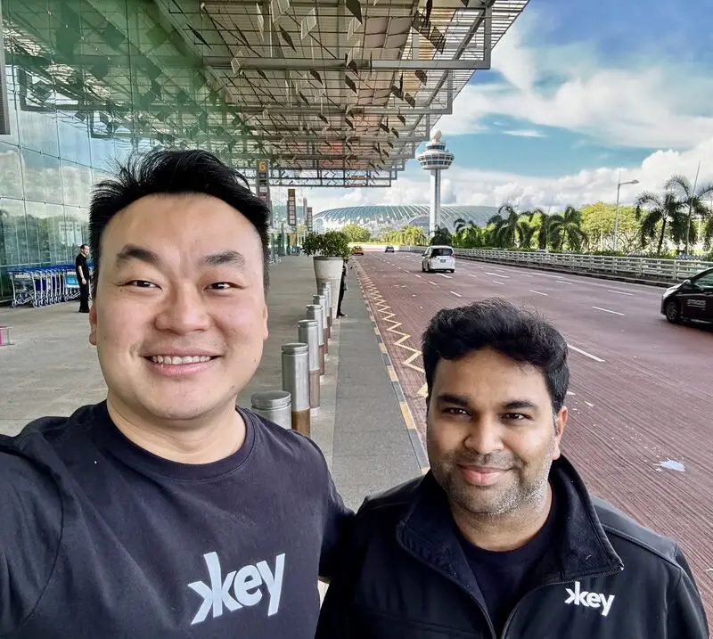 Christopher Fong and Kushagra Shrivastava outside an airport terminal
