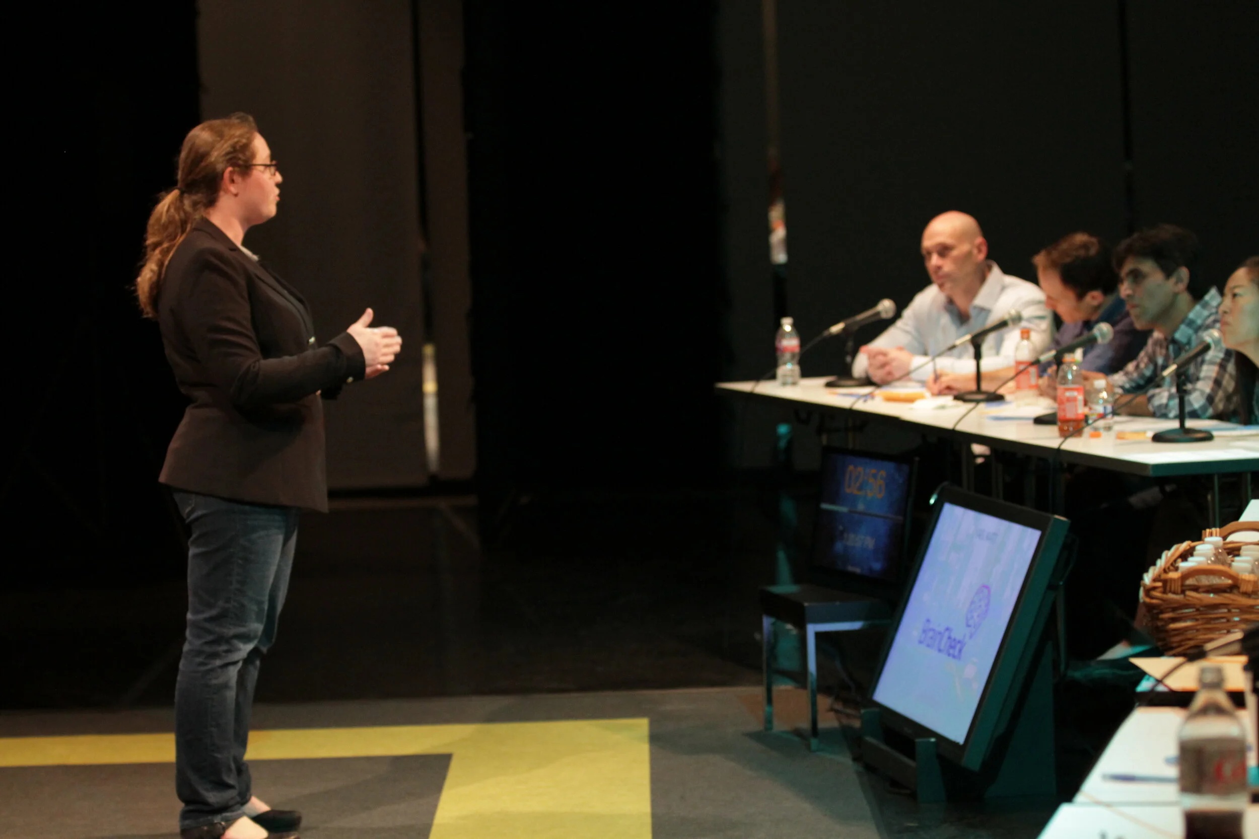 Yael Katz presenting BrainCheck to a panel of judges at Hatch Pitch in 2016