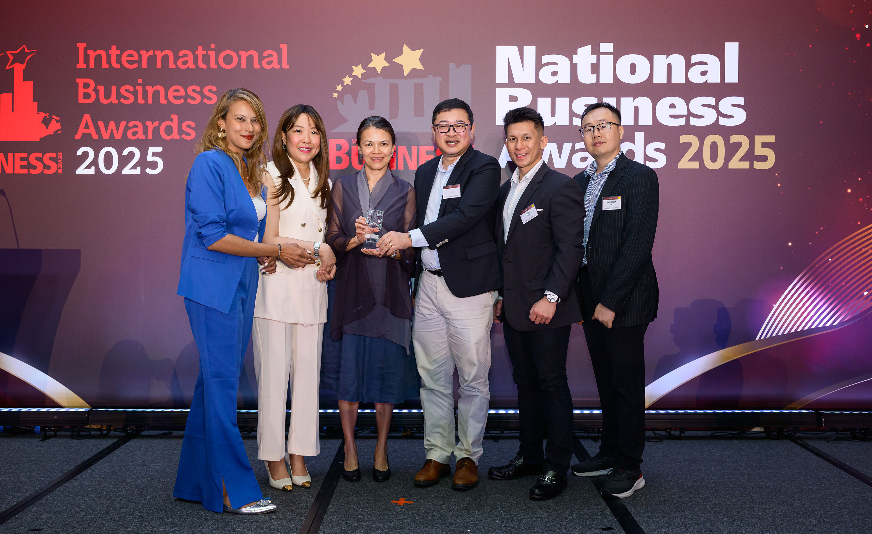 Wiseasy representatives receiving recognition at the 2025 SBR National Business Awards