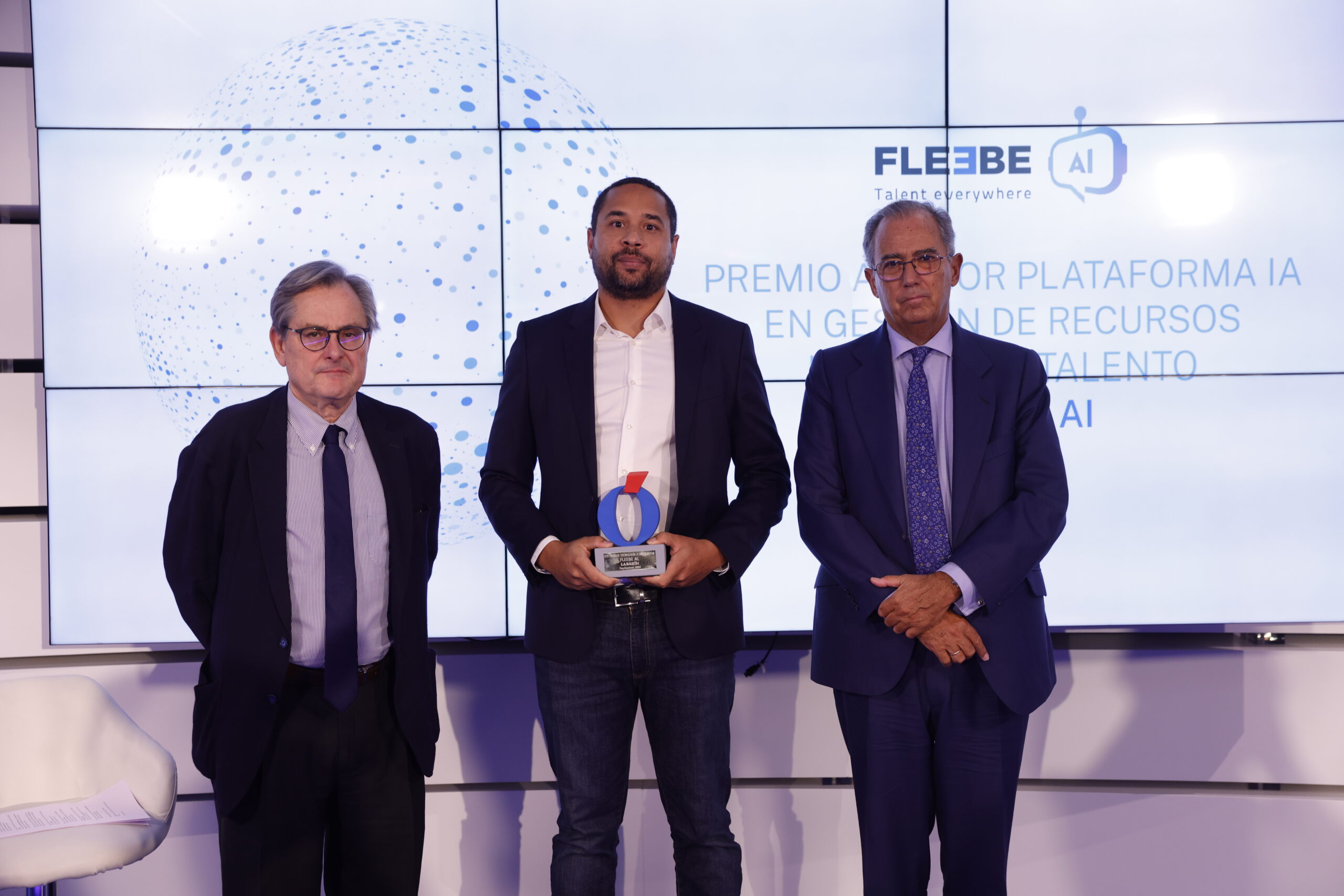 Yann Roche holding Fleebe AI's award at the 2024 La Razón Innovation and Technology Awards