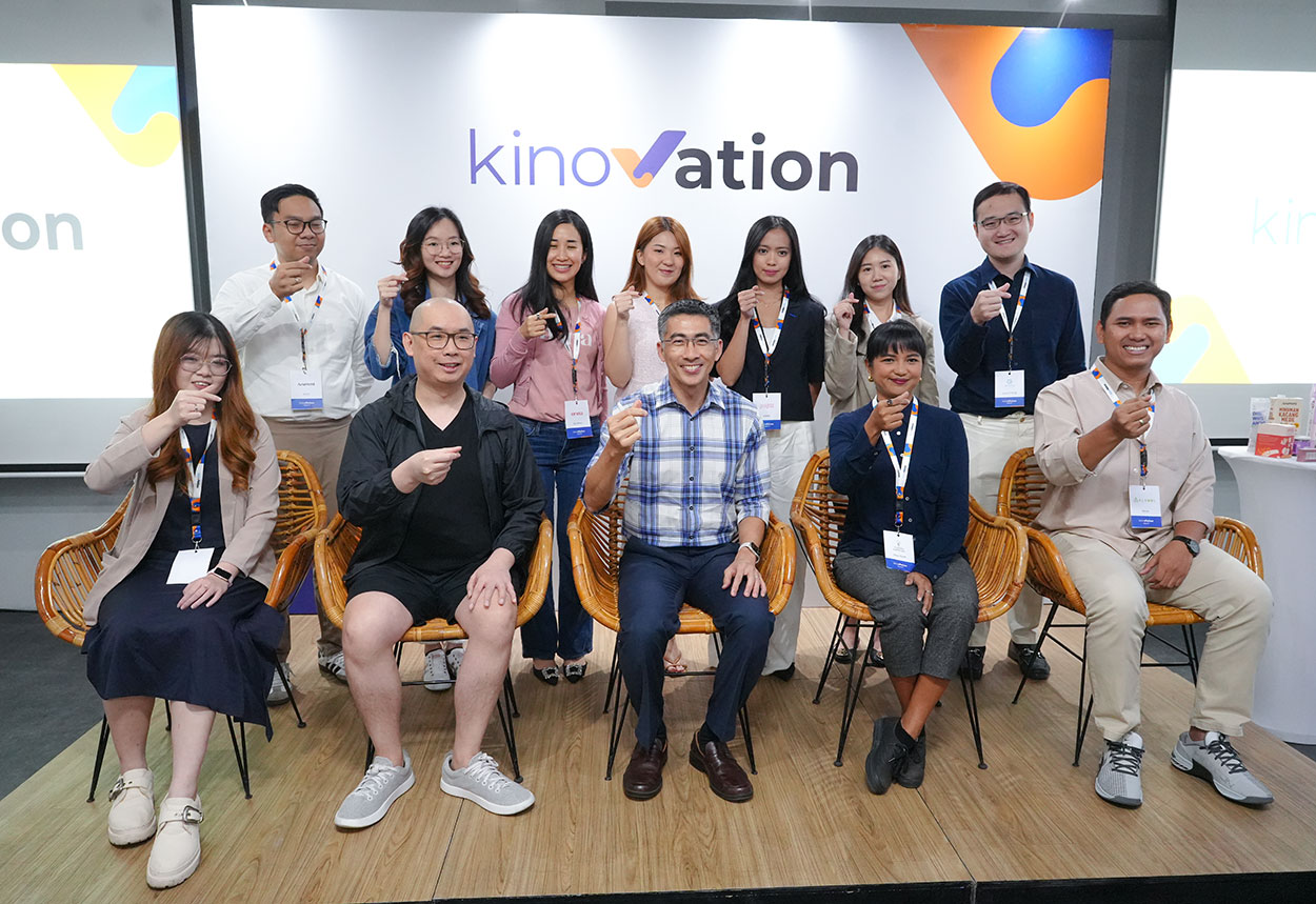 Yansen Kamto, seated second from the left in the front row, with Kinovation participants and Kino leadership