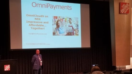 Yash Kapadia presenting OmniCloudX on stage at the Atlanta NonStop user gathering