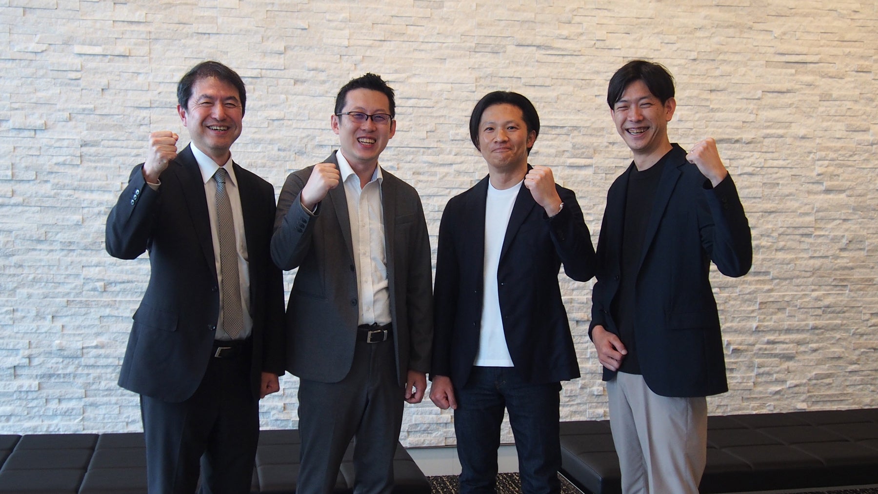 Yasuo Sato, third from left, with NS Solutions and Allganize colleagues at their partnership announcement
