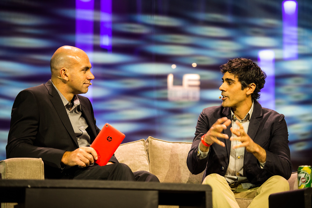 Jeremy Stoppelman and Loïc Le Meur seated onstage at LeWeb London in 2013