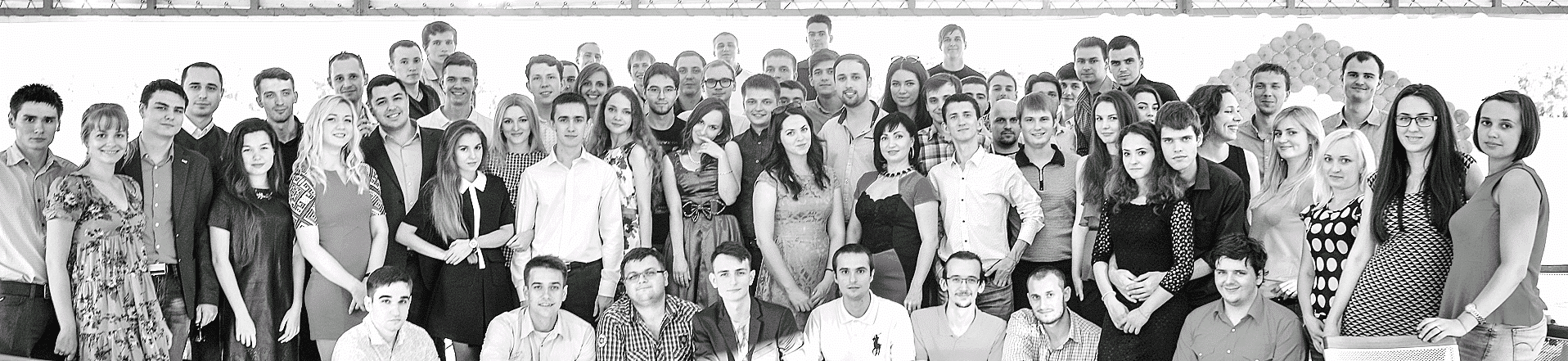 A black-and-white group photograph of the Cleveroad team published with Altynpara's 2017 interview