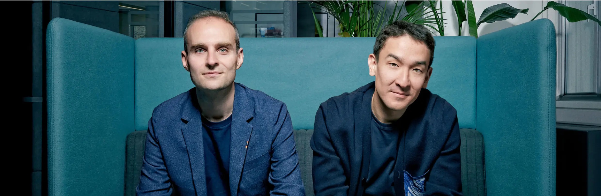 Yiannis Kiachopoulos, left, and Causaly co-founder Artur Saudabayev seated together
