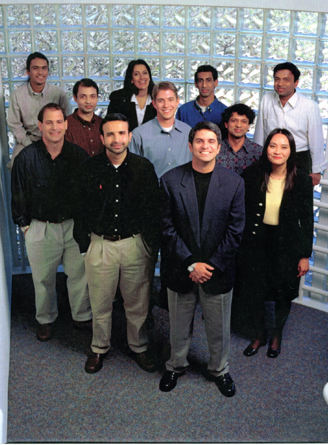 Archival Yodlee team portrait, with Schwark Satyavolu at the front and Sukhinder Singh Cassidy toward the rear