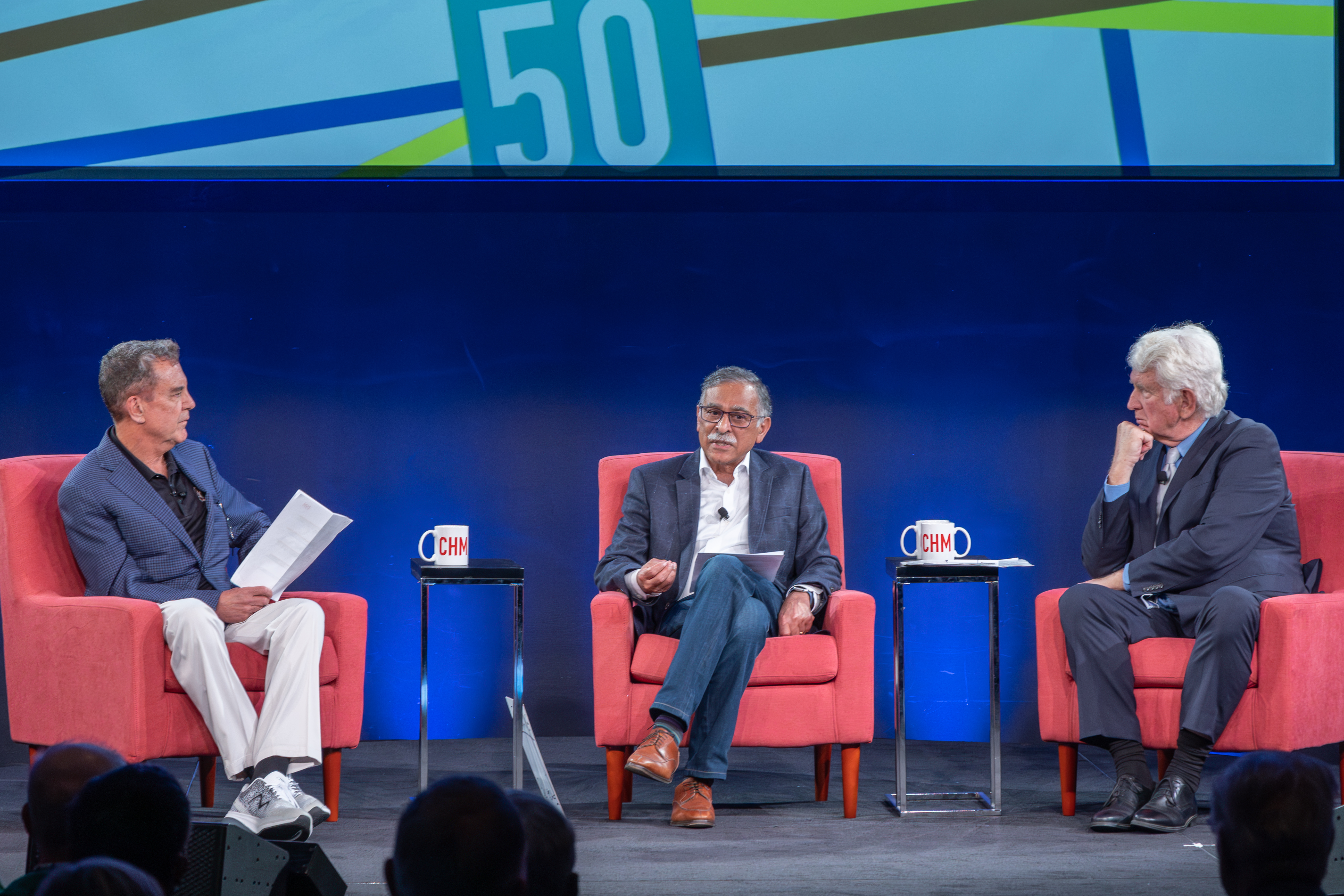 Rich Karlgaard, Yogen Dalal, and Bob Metcalfe seated on stage at the Computer History Museum