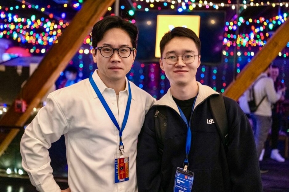 Cuckoo co-founders together beneath colorful lights