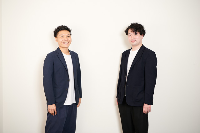 Ubie co-founders Kota Kubo, left, and Yoshinori Abe, right, standing together