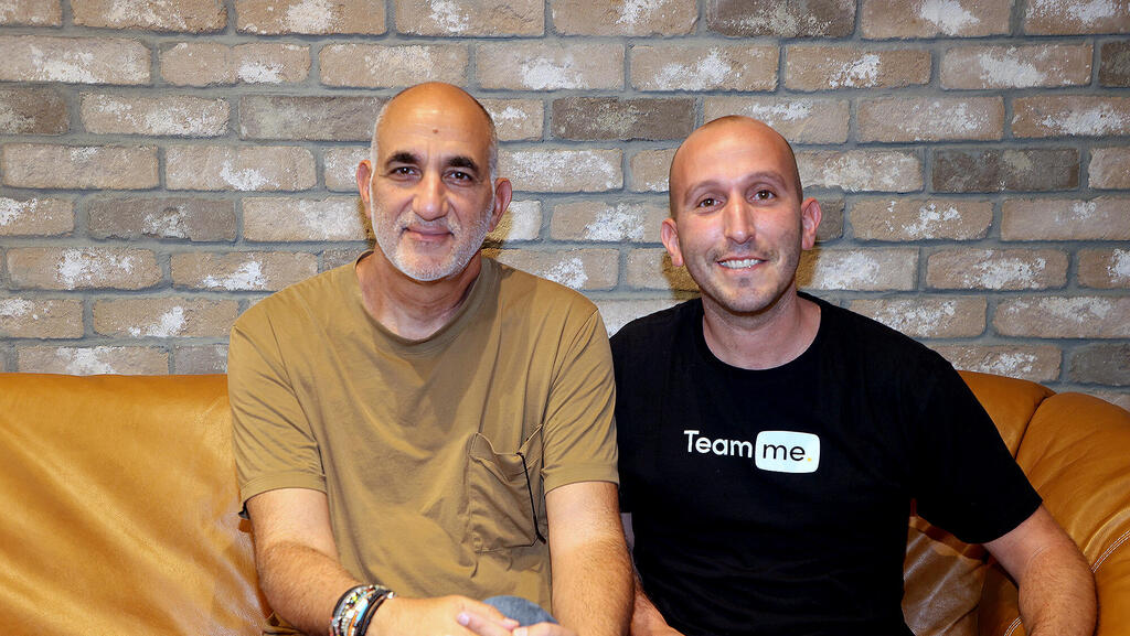 Ronni Zehavi seated on the left beside Yotam Tzuker, who is wearing a Team Me T-shirt.