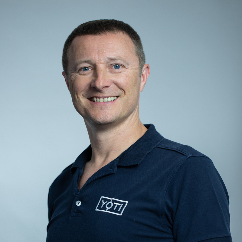 Yoti co-founder and CEO Robin Tombs wearing a navy Yoti shirt