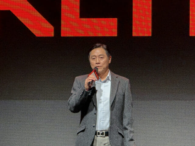 Younghoon Park holding a microphone while presenting at d.day in January 2026