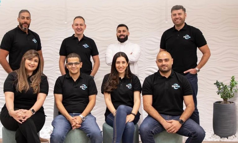 Yousef Shamoun with colleagues in a ZenHR team photograph published with its 2022 funding announcement.